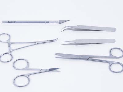 Surgical Tools used in Electronics including scissors, tweezers, and forceps