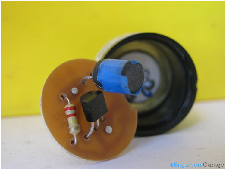 Electronic Components Behind PCB of Piezo Buzzer Electronic Components Behind PCB of Piezo Buzzer