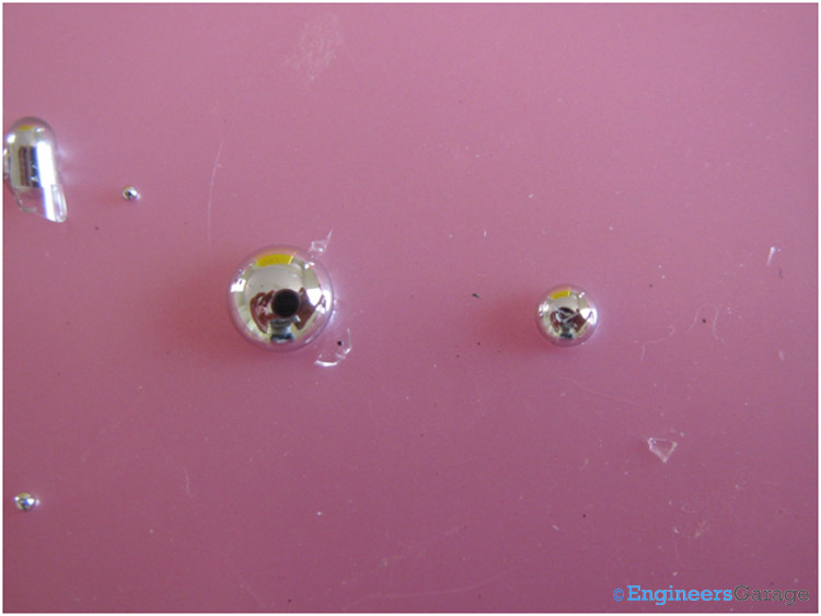 A large Mercury Drop formed by Two Drops Coming Together A large Mercury Drop formed by Two Drops Coming Together