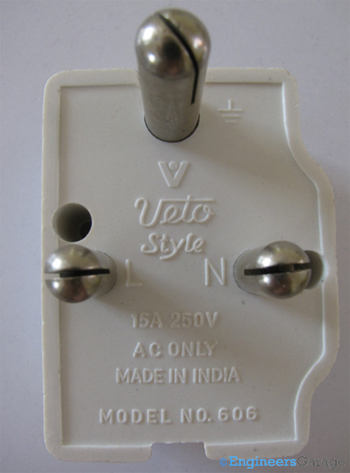Back of Switch Showing Printed Technical Specifications and Three Ports Back of Switch Showing Printed Technical Specifications and Three Ports