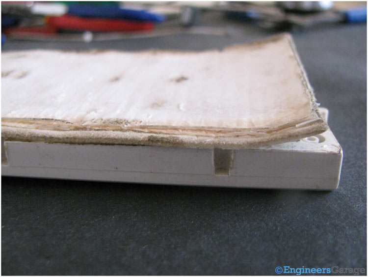 Back View—Bread Board Covered With Thick Paper Attached With Glue