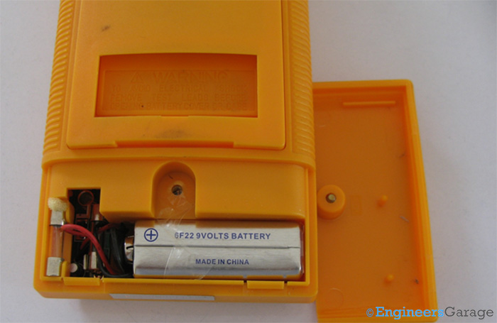 Battery and Fuse Encased in Multimeter Rear