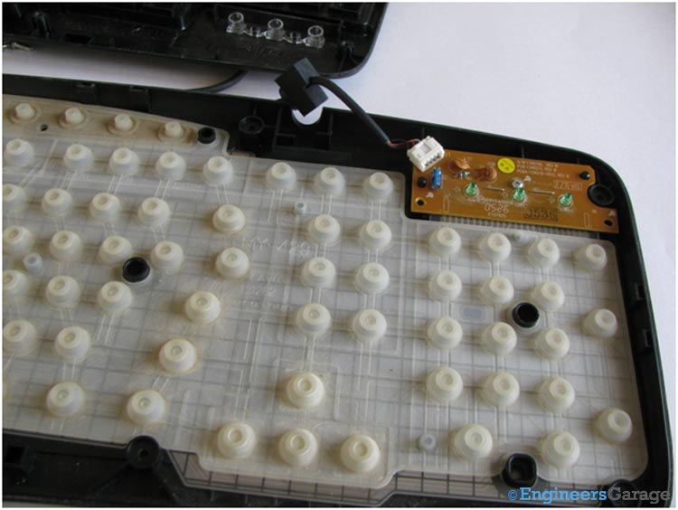 Dome-Shaped Rubber Buttons Inside Rear Cover of Keypad Dome-Shaped Rubber Buttons Inside Rear Cover of Keypad