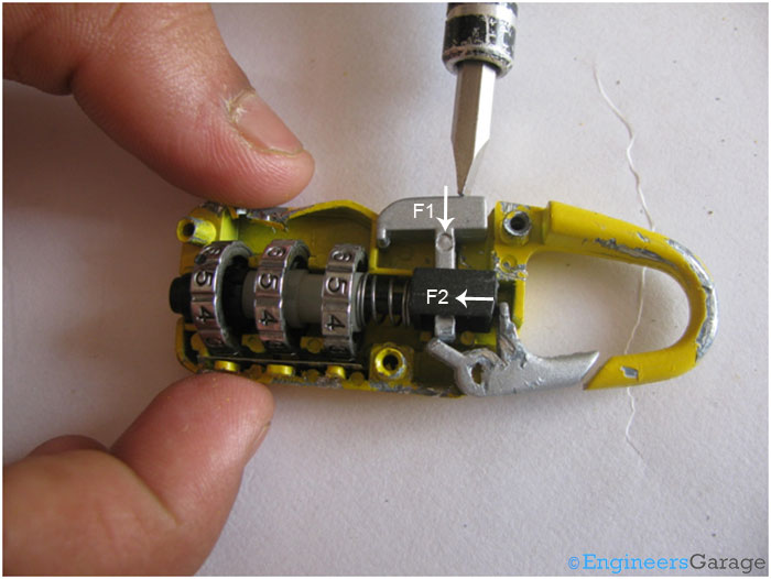 Explanatory Image Showing Locking Mechanism of A Number Combination Lock Explanatory Image Showing Locking Mechanism of A Number Combination Lock