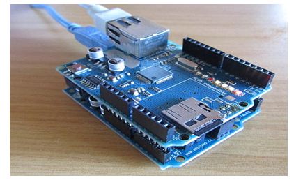 Image of Arduino Ethernet Shield Connected at the top of Arduino UNO