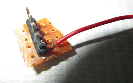 Image of Connecting Wire Attached to 4-pin Male Header Image of Connecting Wire Attached to 4-pin Male Header
