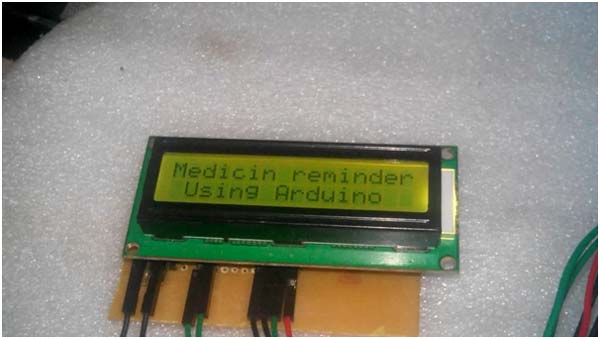 Image of LCD Module showing initial messages on Medicine Reminder System