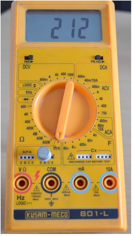 Image of multimeter showing HFE value of PNP Transistor
