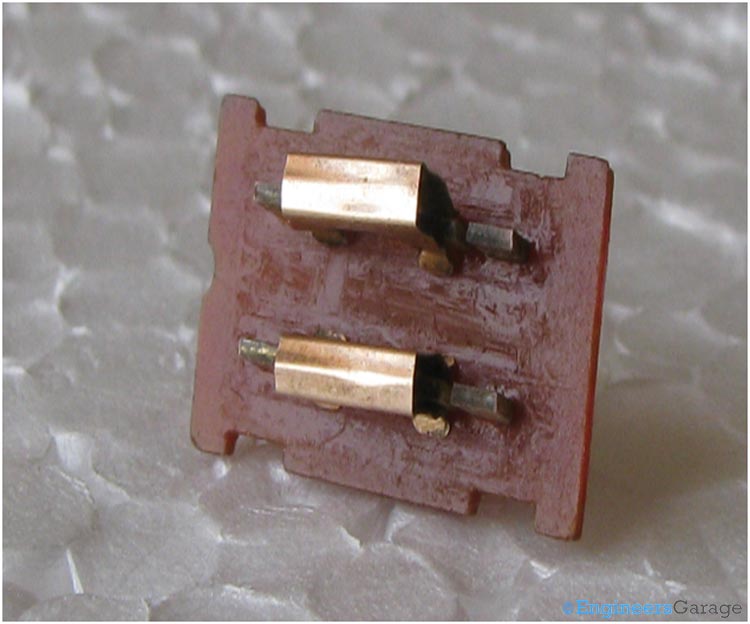 Image Showing How Clips are used to Make Contacts Between Plates