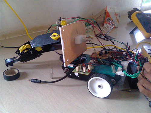 Image showing Mobile operated Pick and Place Robot in action Image showing Mobile operated Pick and Place Robot in action