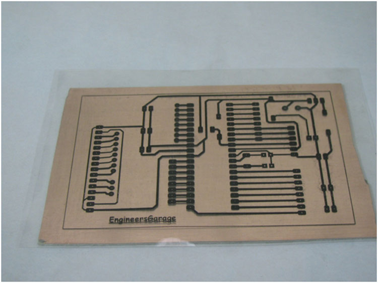 Image Showing OHP Sheet Placed on Copper Side of PCB Image Showing OHP Sheet Placed on Copper Side of PCB