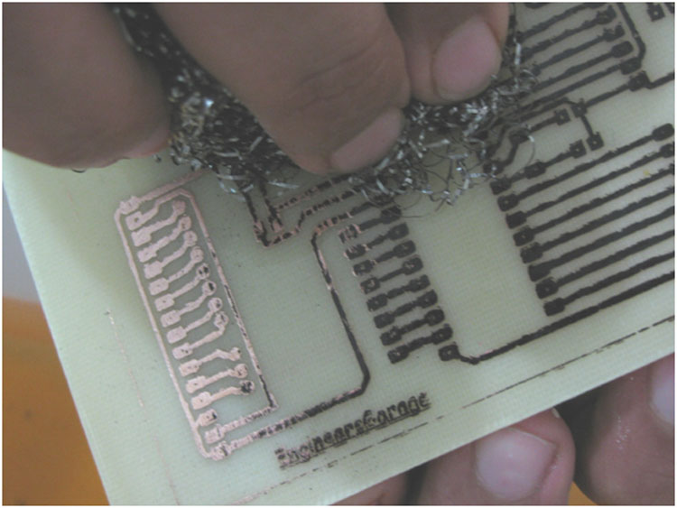 Image showing PCB cleaned by steel wool Image showing PCB cleaned by steel wool