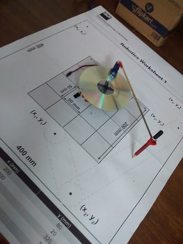Image showing Robotic Arm moving Pencil Tool over the robotic worksheet
