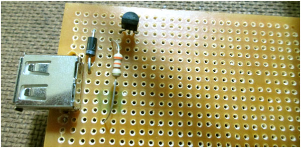 Image showing transistor circuit soldered near USB connector