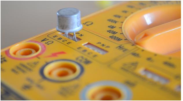 Image showing transistor placed correctly in transistor region of multimeter