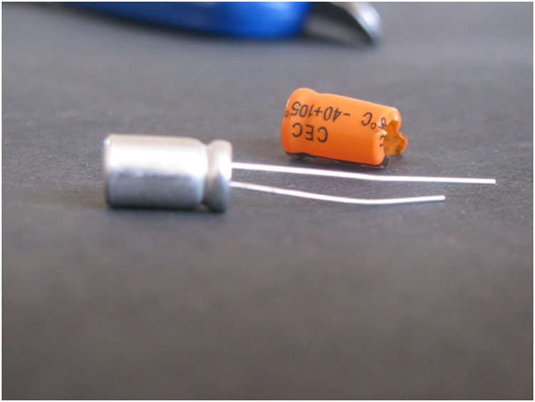 Outer Casing of Electrolytic Capacitor with Labeled Plastic Covering Outer Casing of Electrolytic Capacitor with Labeled Plastic Covering