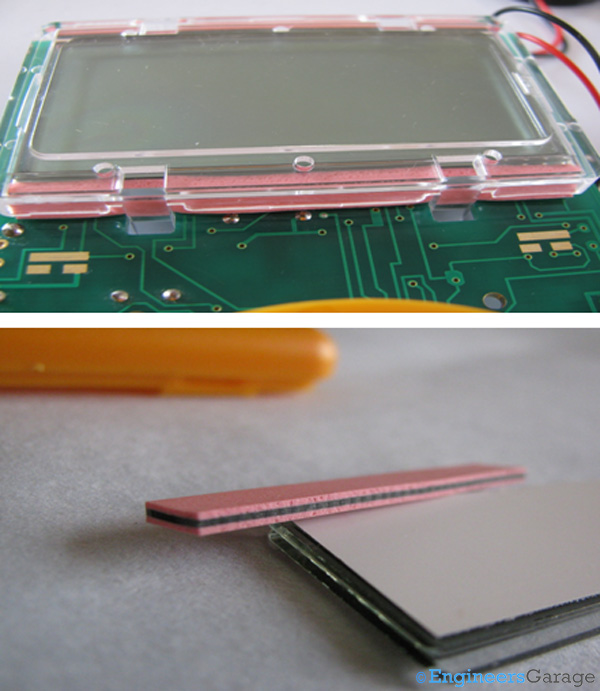 Plastic Covering of LCD (top) and Shock-Absorption Rubber Pads