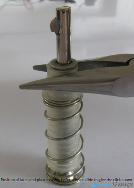Position of Latch and Plastic Casing before they Collide to give Click Sound Position of Latch and Plastic Casing before they Collide to give Click Sound