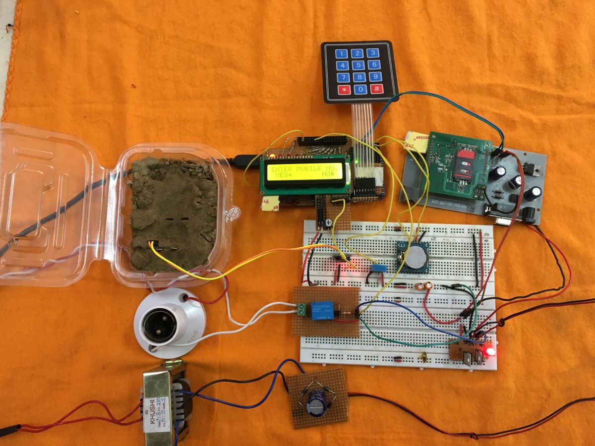 Prototype of Arduino based Soil Moisture Detector and Mobile operated Automatic Water Pump Controller