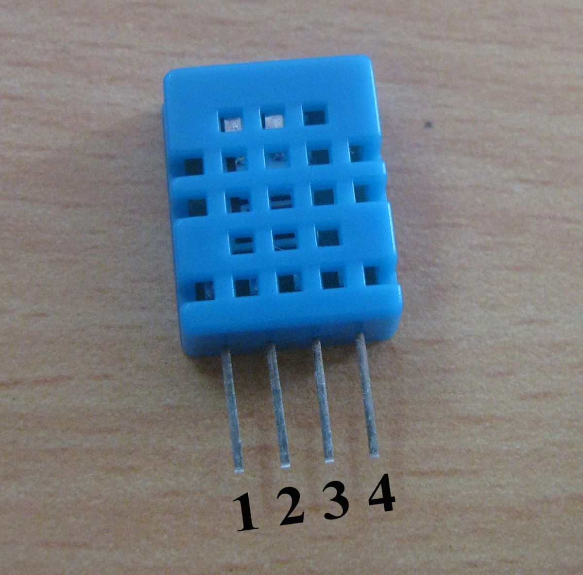 Typical image of DHT-11 Temperature and Humidity Sensor with Pin Numbers